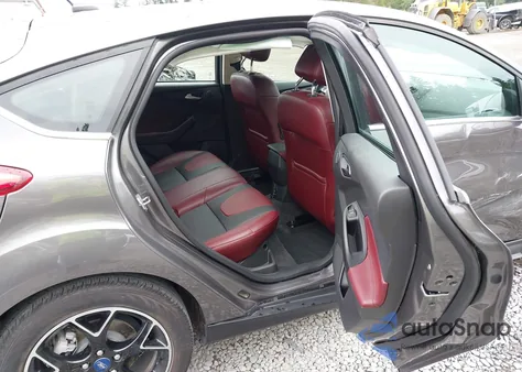 2012 Ford Focus Titanium z USA, uszkodzony, nr VIN 1FAHP3N28CL210557